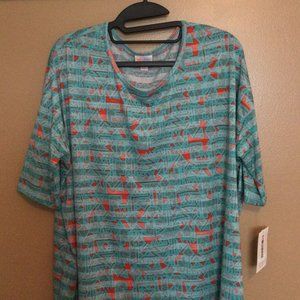 NWT Lularoe Irma Shirt, size Medium. Blue with pattern in orange and white